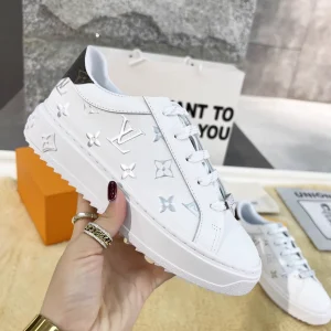 Louis Vuitton Time Out Monogram Embossed Leather White Sneakers image 1