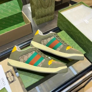 Gucci Vintage Distressed Sneakers image 1