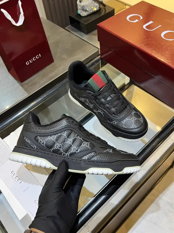 Gucci Distressed GG Monogram Low-Top Sneakers image 1