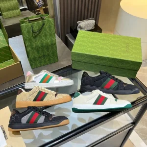 Gucci Vintage Distressed Sneakers image 1