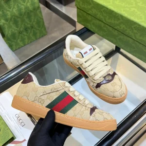 Gucci Vintage Distressed Sneakers image 1