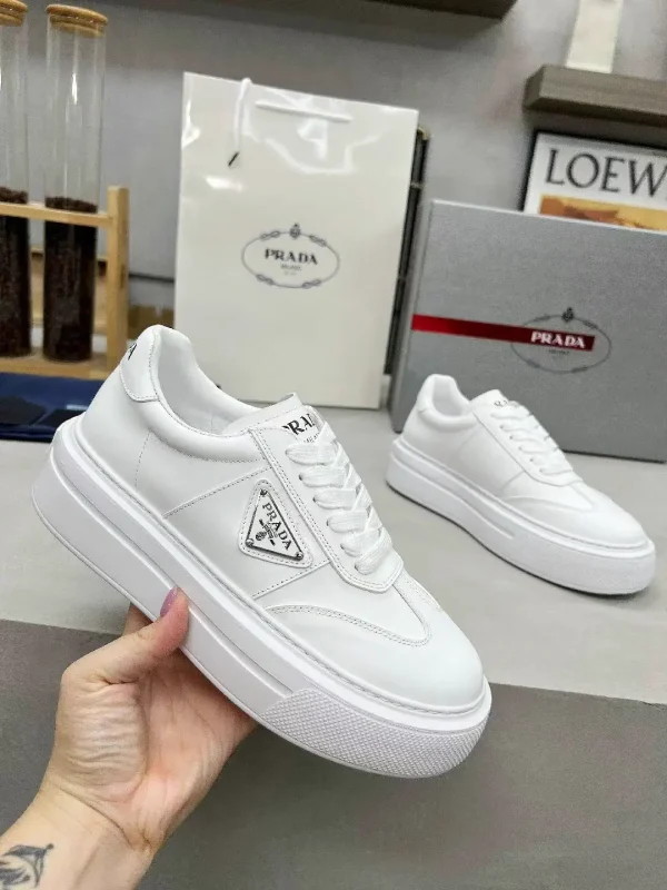 Men's and Women's White Leather Sneakers image 1