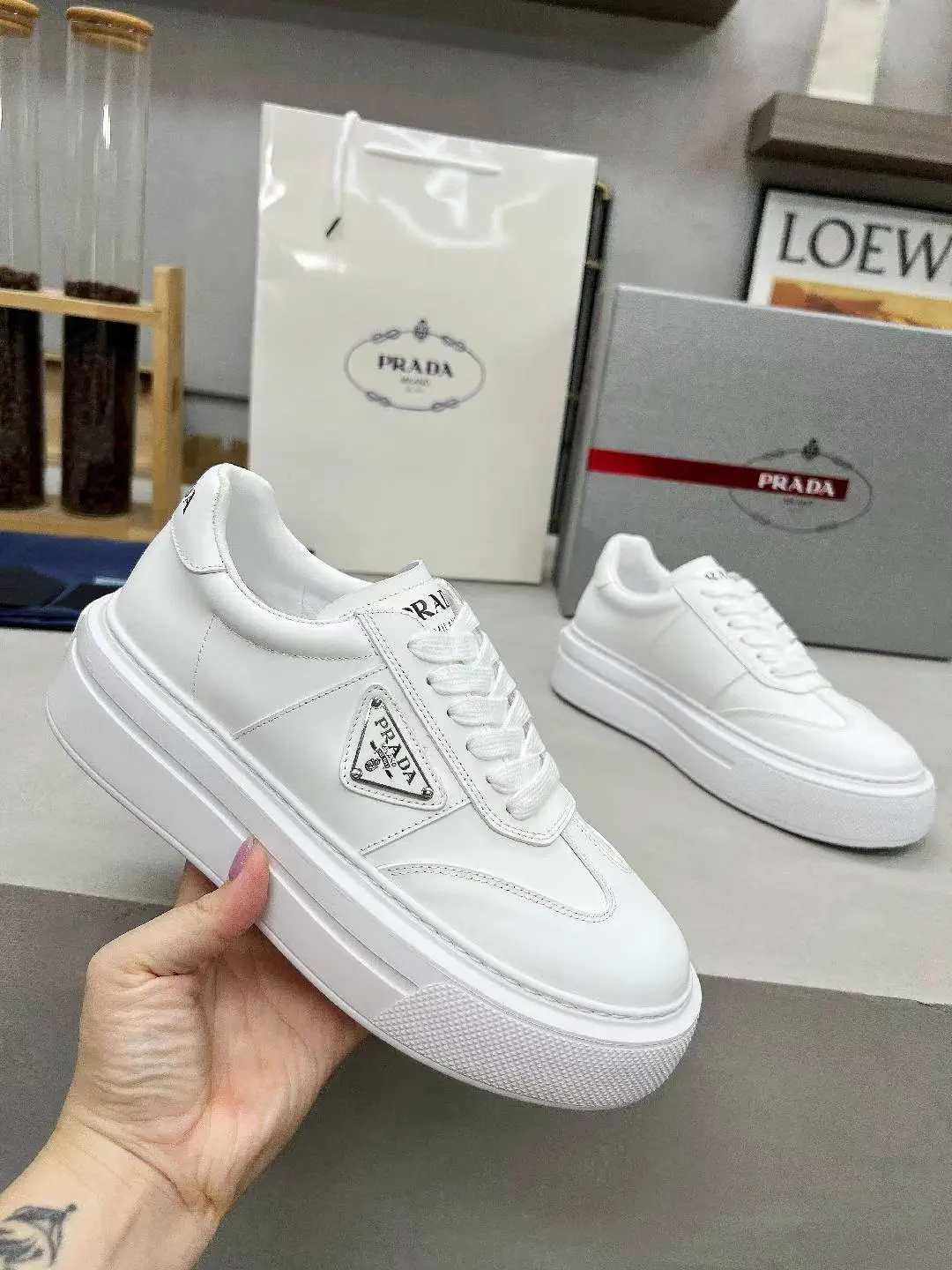 Men's and Women's White Leather Sneakers image 1