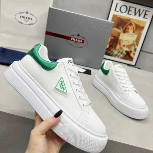 Men's and Women's White Leather Sneakers image 1