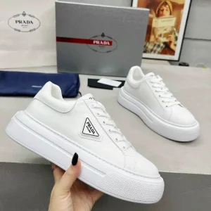 Men's and Women's White Leather Sneakers image 1