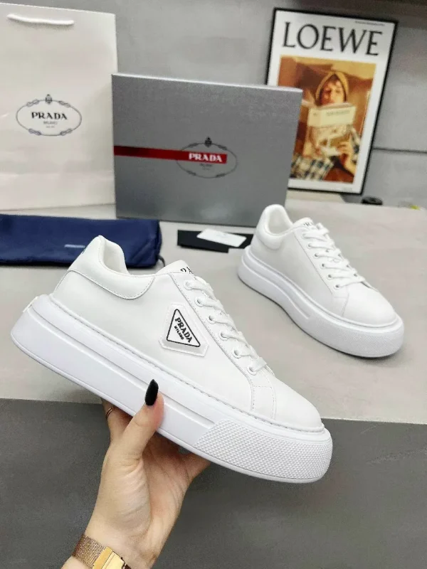 Men's and Women's White Leather Sneakers image 1