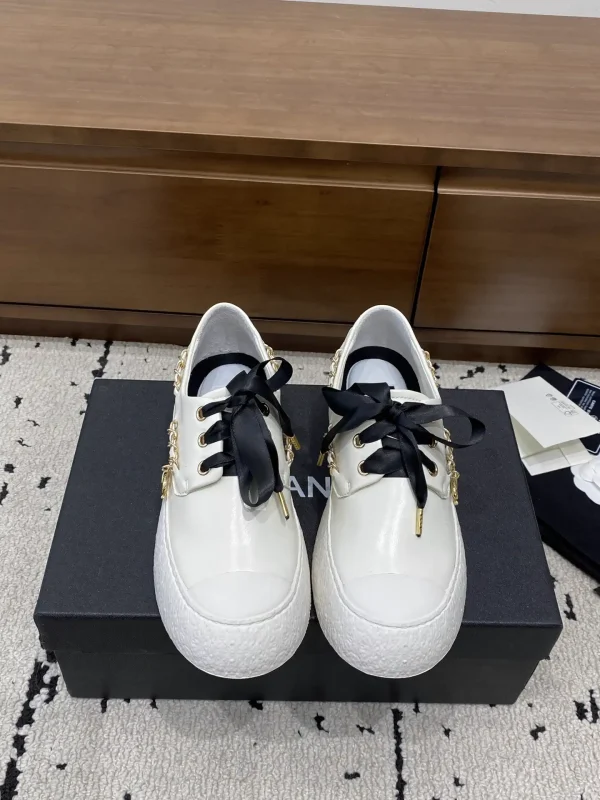 White Lace-Up Casual Flats with Chain Details image 1