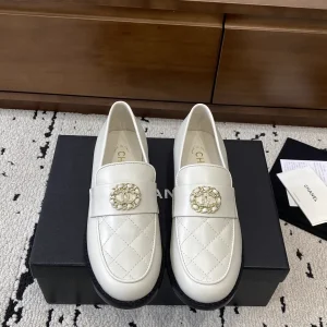 CHANEL White Quilted Loafers with Decorative CC Emblem image 1