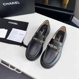 CHANEL Black Leather Loafers with Chain Detail image 1