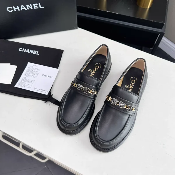 CHANEL Black Leather Loafers with Chain Detail image 1
