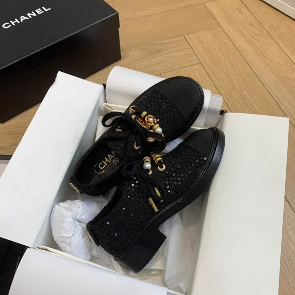 CHANEL Women's Lace-Up Loafers with Decorative Charms image 1