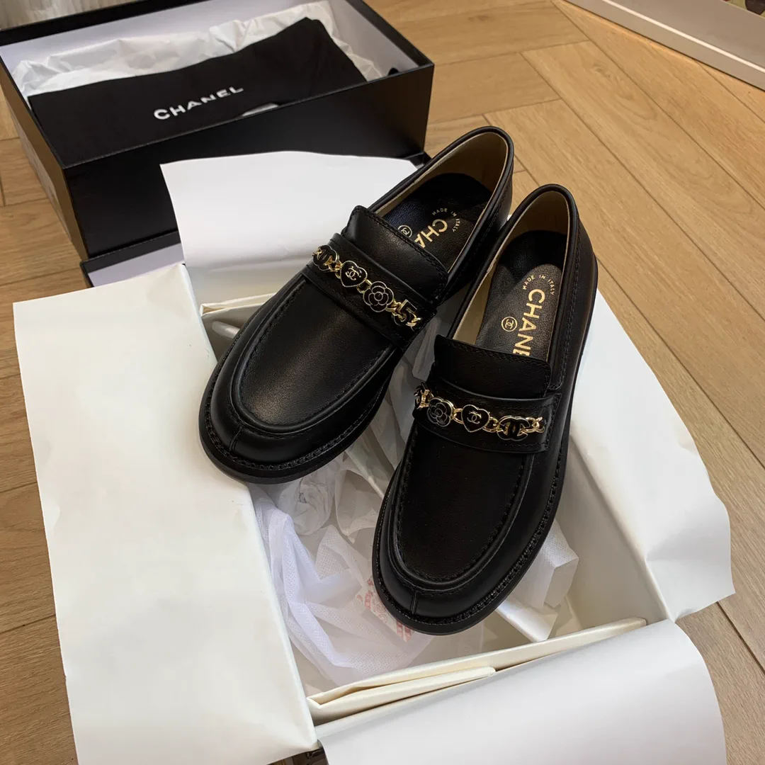 CHANEL Black Leather Loafers with Gold Chain Detail image 1