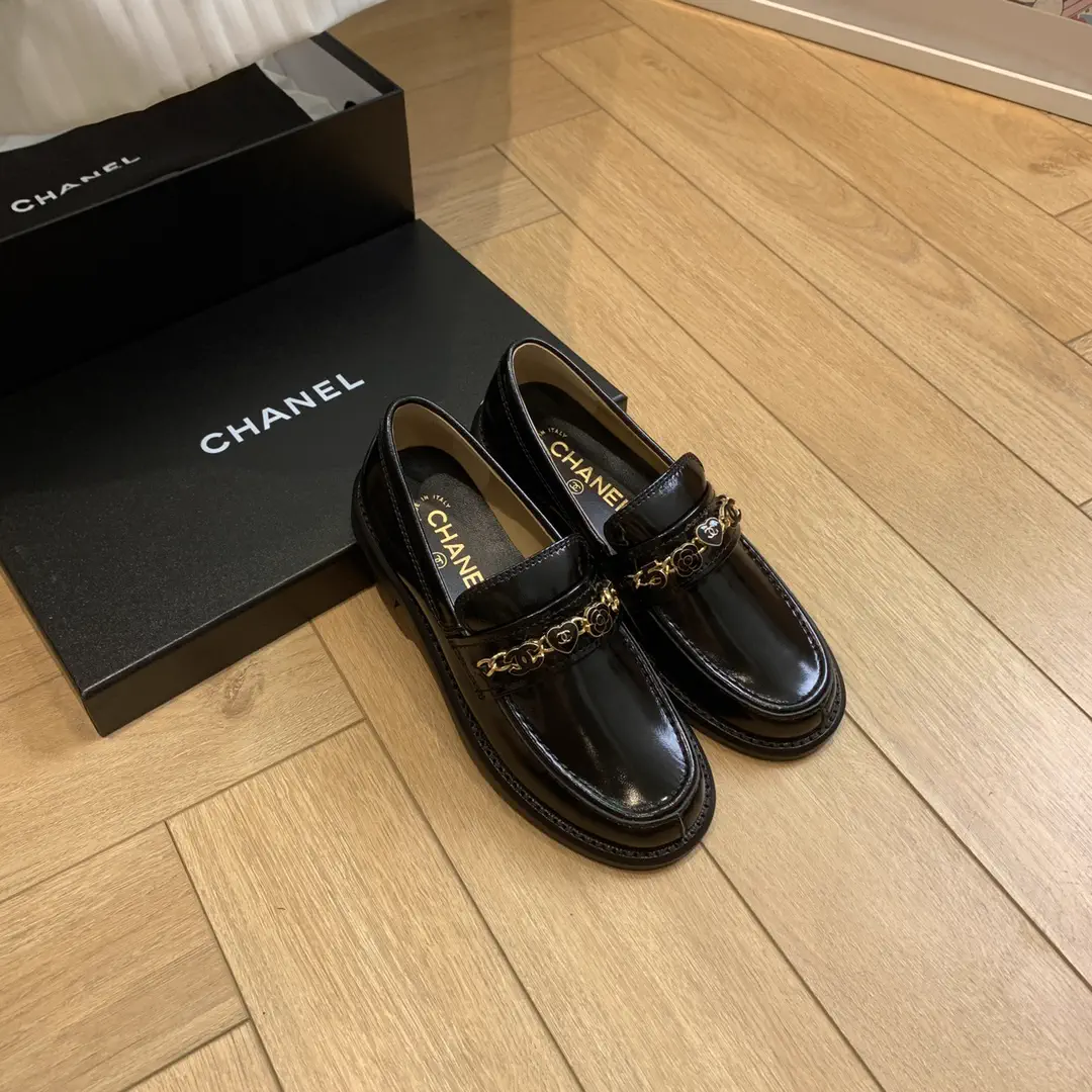 CHANEL Black Leather Loafers with Gold Chain Detail image 1