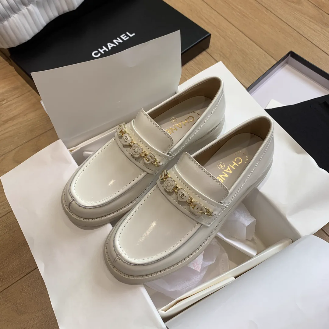CHANEL Women's White Leather Loafers with Charm Chain image 1
