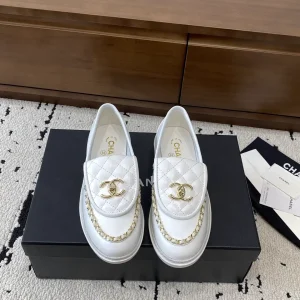 CHANEL White Quilted Leather Loafers with Gold CC Logo image 1