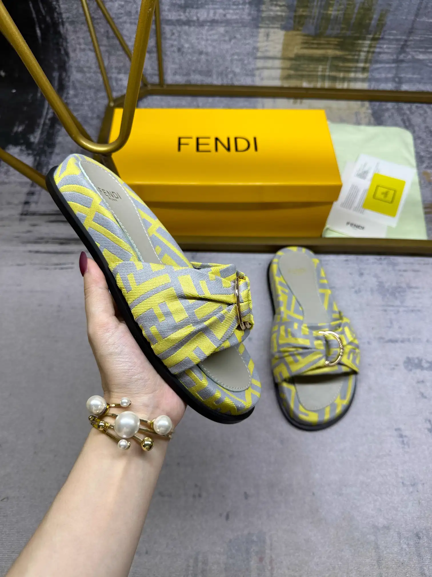 FENDI Flat Slide Sandals with Knotted Strap and Gold-tone Hardware image 1