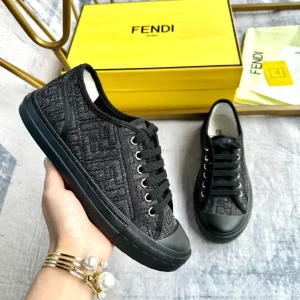 FENDI Domino Series Distressed Black Denim Sneakers image 1