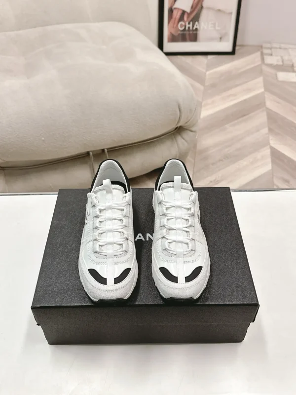White Casual Sneakers with Black Accents image 1