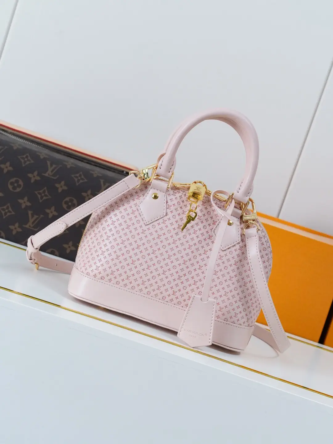 Louis Vuitton Pink Monogram Alma BB Top Handle Bag image 1