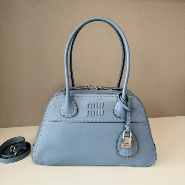 Miu Miu Embossed Logo Top Handle Bag image 1