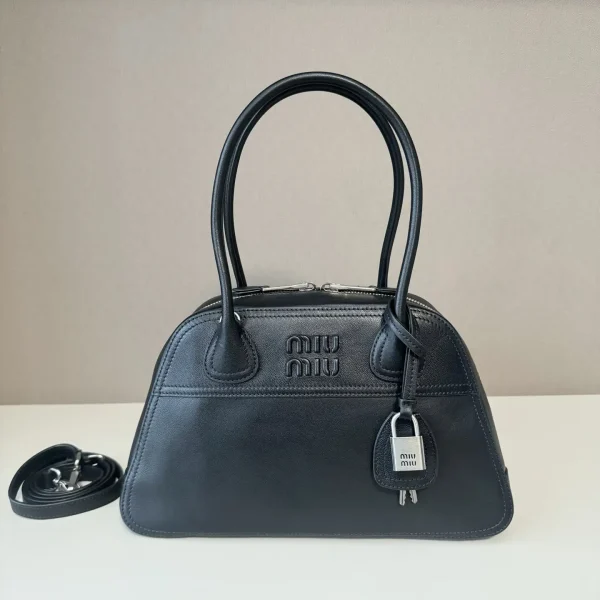 Miu Miu Embossed Logo Leather Top Handle Bag image 1