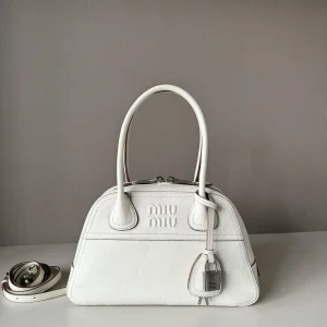 Miu Miu Embossed Logo Top Handle Bag image 1