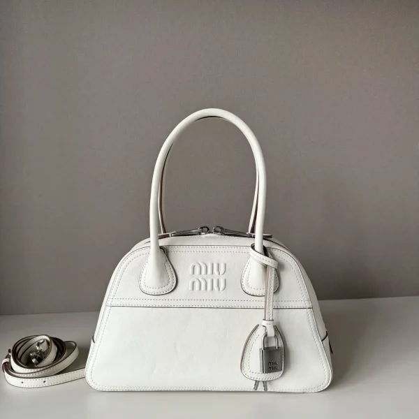 Miu Miu Embossed Logo Top Handle Bag image 1
