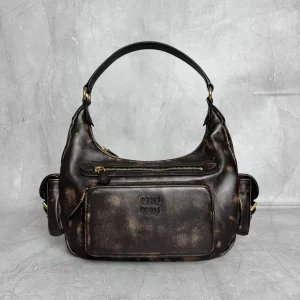 Miu Miu Distressed Pocket Shoulder Bag image 1