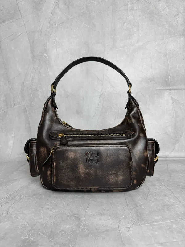 Miu Miu Distressed Pocket Shoulder Bag image 1