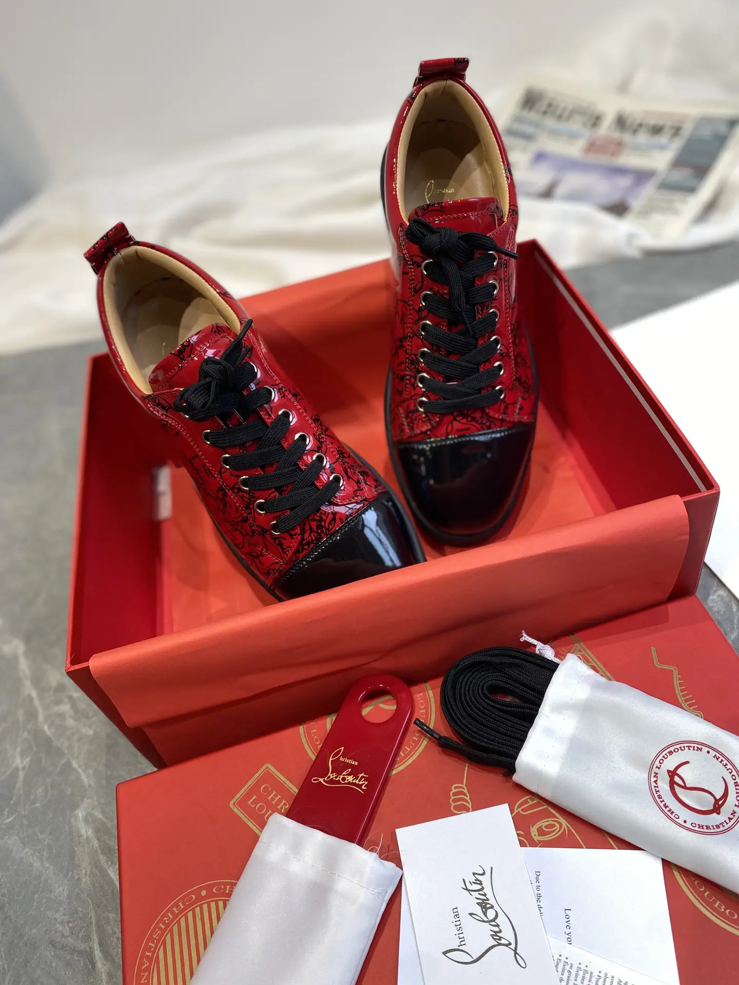 Low-Top Printed Black and Red Sneakers image 1