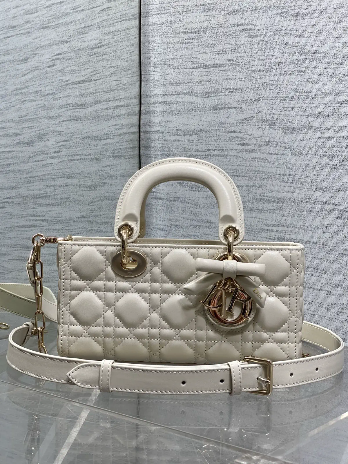 Dior Quilted Top Handle Bag with Bow Charm image 1