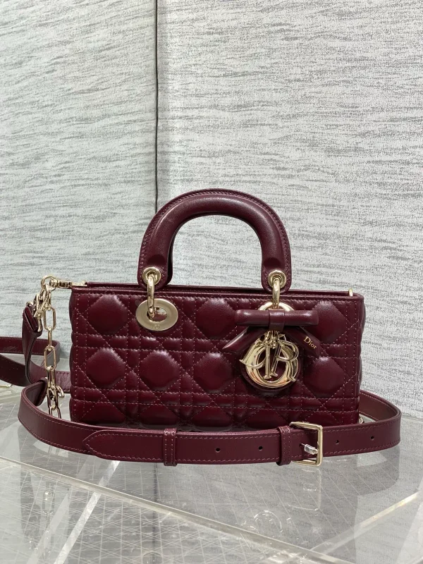 Dior Quilted Top Handle Bag with Bow Hardware image 1