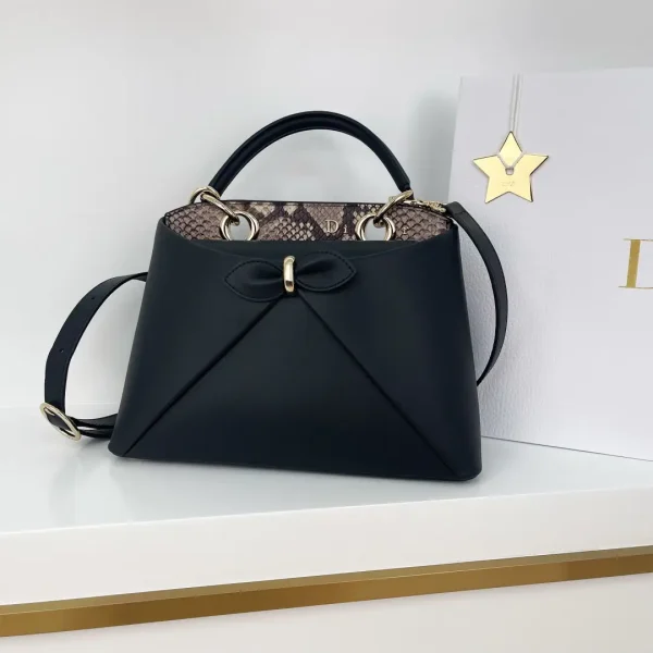 Dior Black Top Handle Bag with Snake Print Trim and Bow Detail image 1