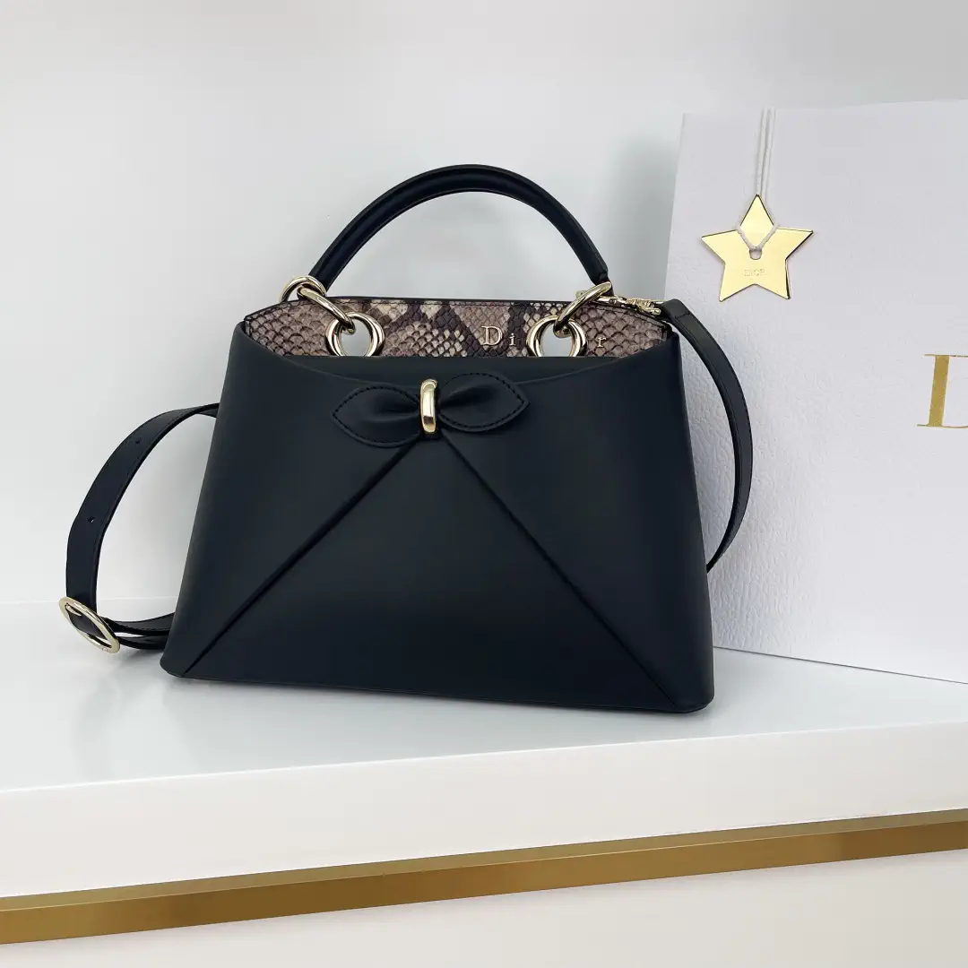Dior Black Top Handle Bag with Snake Print Trim and Bow Detail image 1