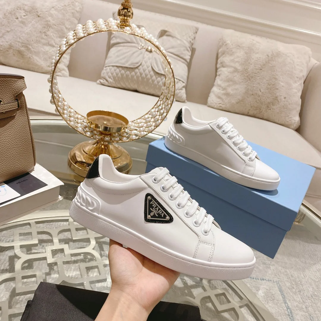 Prada New Metal Logo Lace-Up White Sneakers image 1