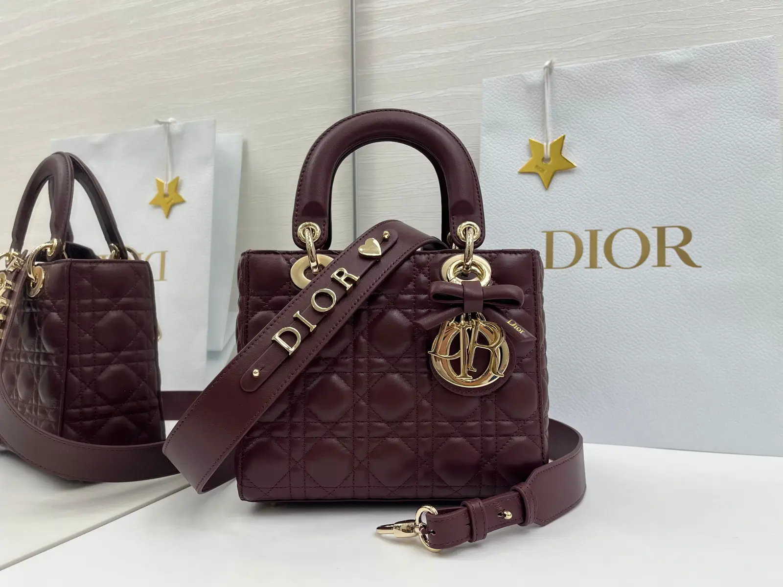 Dior Quilted Top Handle Bag with Bow Charm image 1