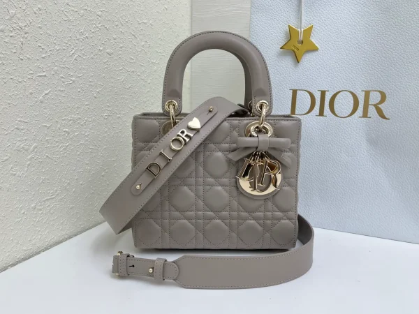 Dior Quilted Top Handle Bag with Bow Charm image 1