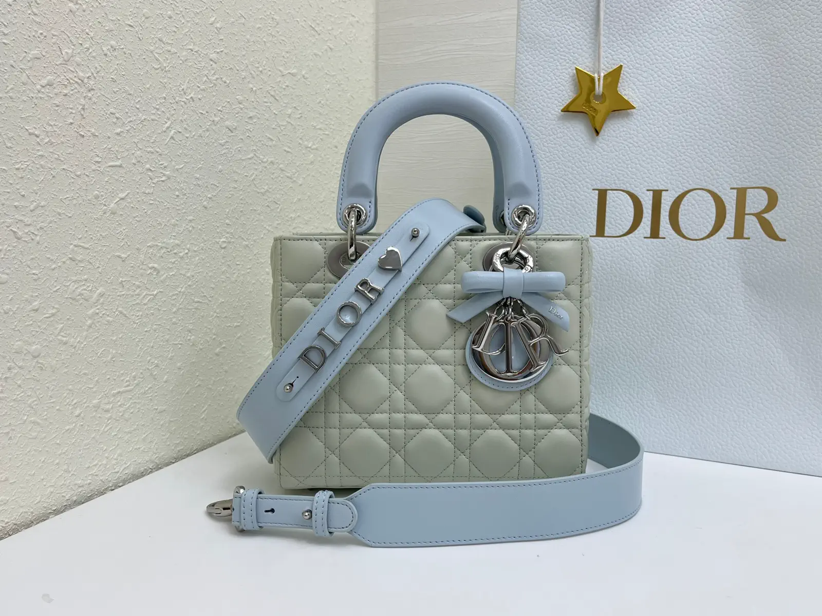 Dior Quilted Top Handle Bag with Bow Charm and Detachable Strap image 1