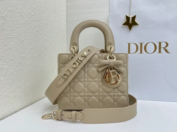 Dior Quilted Top Handle Bag with Bow Charm image 1