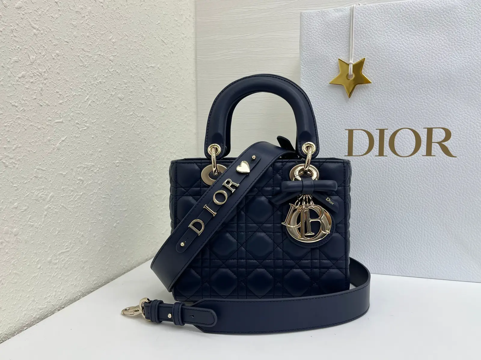 Dior Quilted Top Handle Bag with Bow Charm image 1