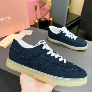 Miu Miu Vintage Distressed Fringed Canvas Sneakers image 1
