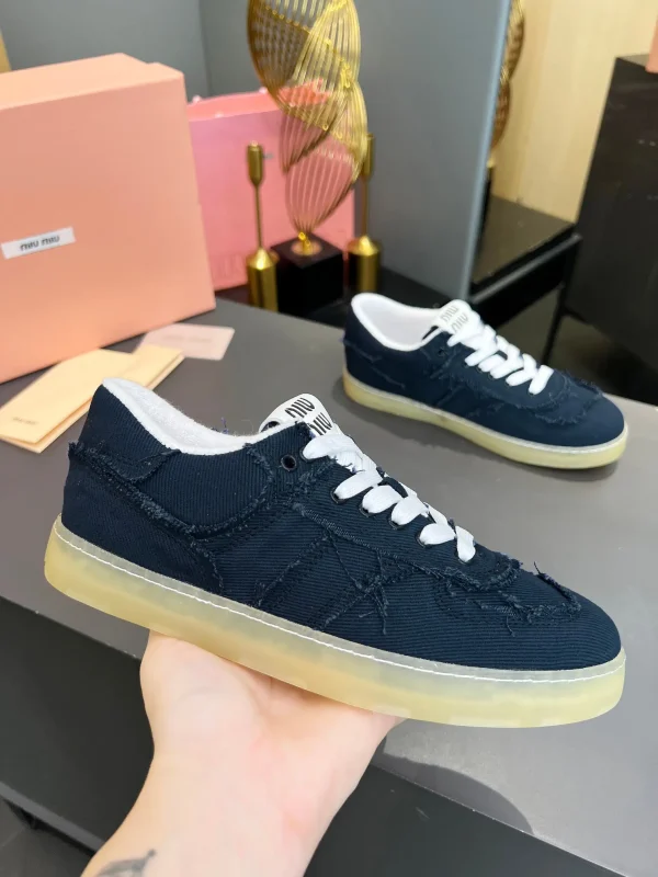 Miu Miu Vintage Distressed Fringed Canvas Sneakers image 1