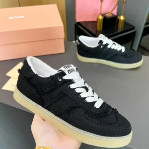 Miu Miu Vintage Distressed Fringed Canvas Sneakers image 1