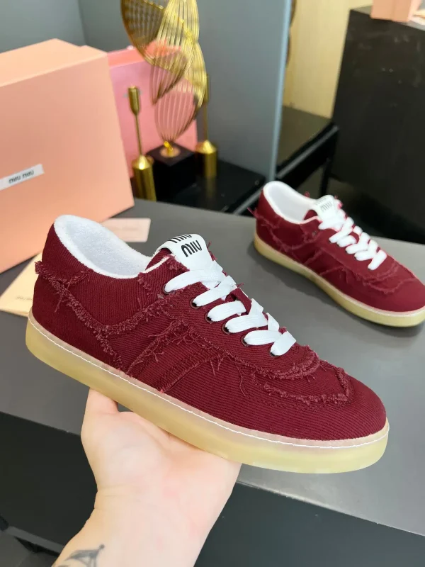 Miu Miu Vintage Distressed Fringed Canvas Sneakers image 1