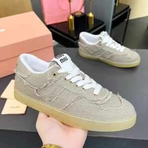 Miu Miu Vintage Distressed Fringed Canvas Casual Sneakers image 1