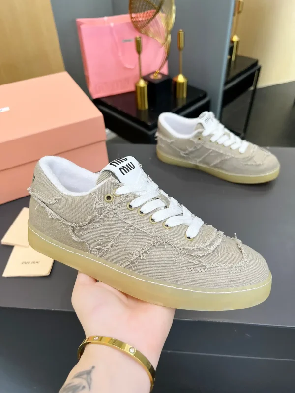 Miu Miu Vintage Distressed Fringed Canvas Casual Sneakers image 1