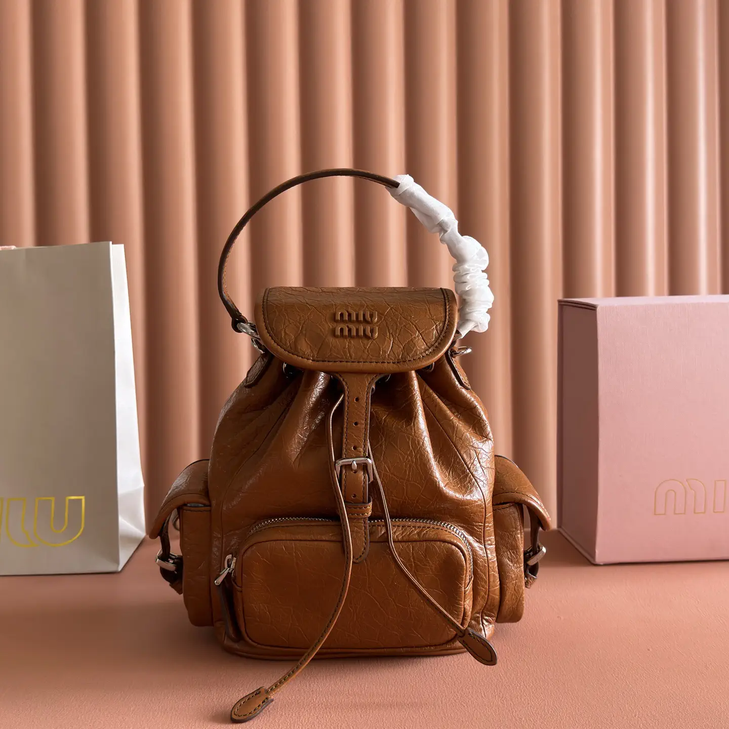 Miu Miu Brown Multi-Pocket Backpack image 1