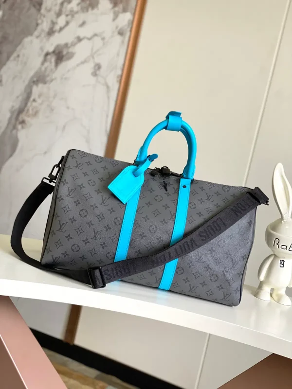 Louis Vuitton Monogram Duffle Bag with Turquoise Trim image 1