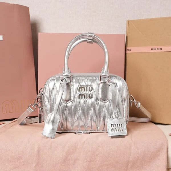 Miu Miu Quilted Metallic Top Handle Bag image 1