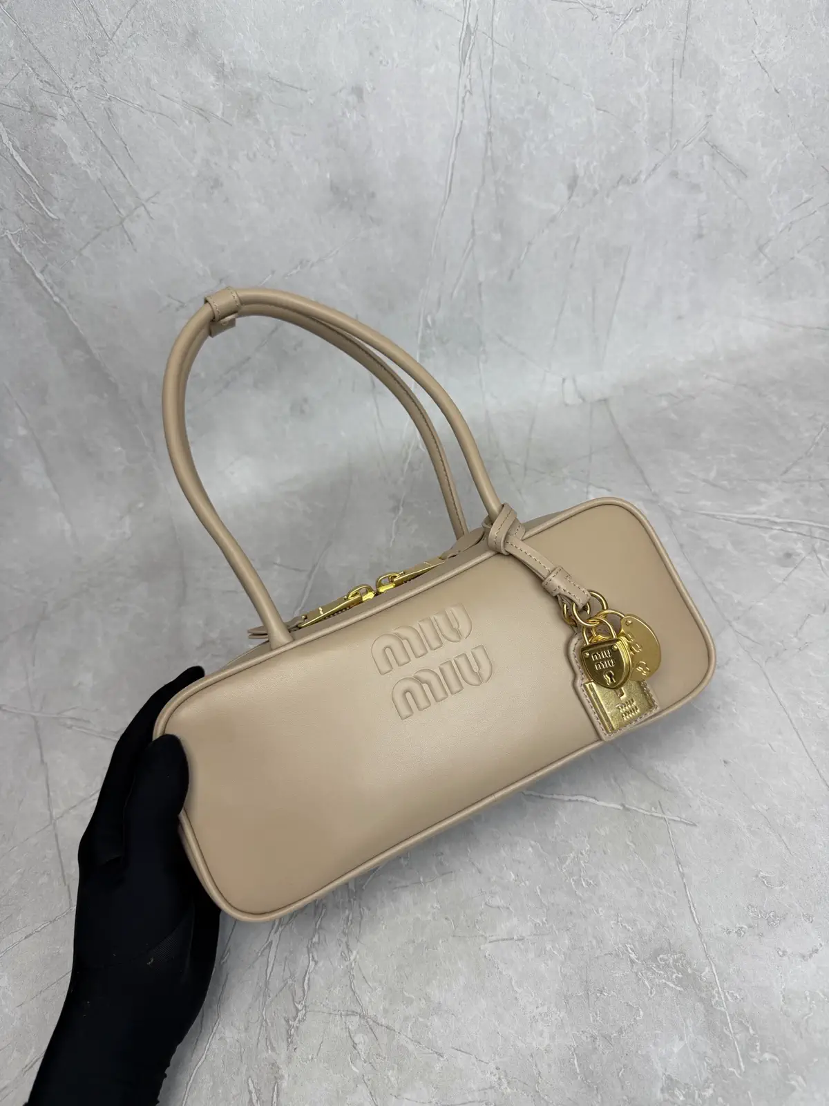 Miu Miu Beige Top Handle Bag with Lock Charms image 1